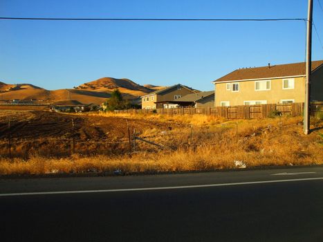 Group of houses in a horizon on a sunny day.