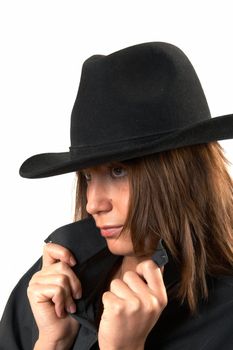 The girl in a black shirt and a cowboy's hat 