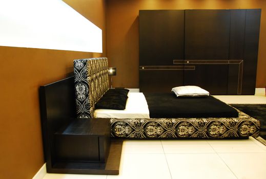 Modern hotel room with king sized bed.
