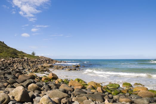 Deserted tropical coastline, with loads of copy space.