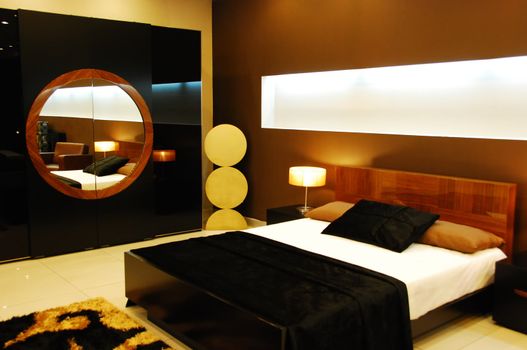 Modern hotel room with king sized bed.