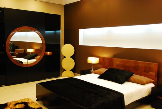 Modern hotel room with king sized bed.