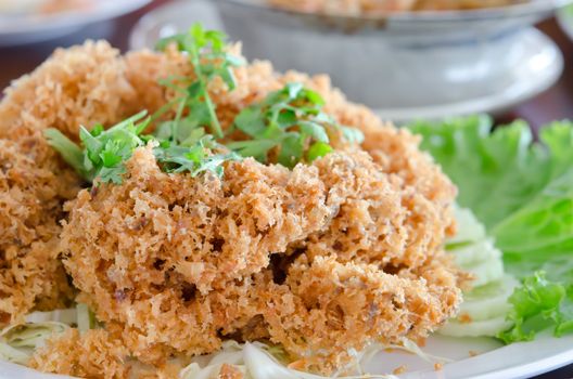 crispy catfish served with fresh vegetable  . Thai food