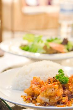 deep fried shrimp with chili sauce , served with steamed rice