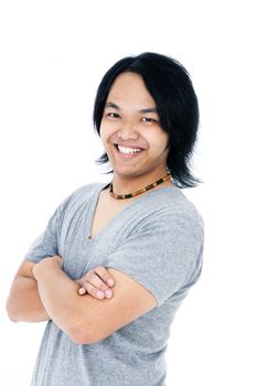 Portrait of a confident young Asian man smiling, isolated on white background.