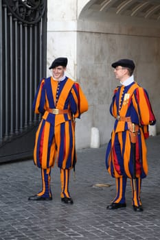 VATICAN - MAY 11: Famous Swiss Guard on May 11, 2010 in Vatican. The Papal Guard with 110 men probably is the world's smallest army.