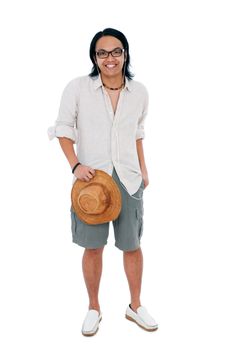 Full length portrait of a happy young Asian man standing against white background.