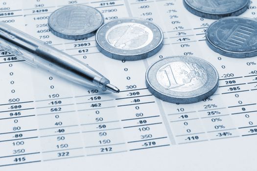 Business background, market analysis concept with financial data, pen and euro coins in blue