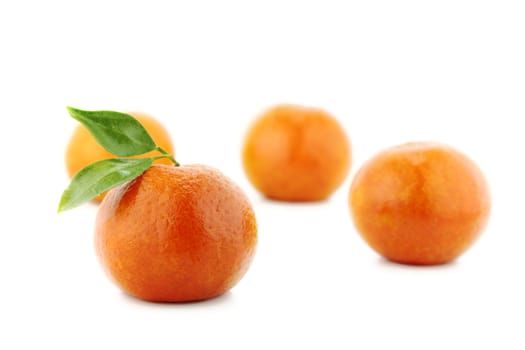 fresh mandarin with leaf isolated on white.