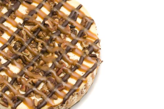 Carmel Pecan Cheesecake with copy space on the right.