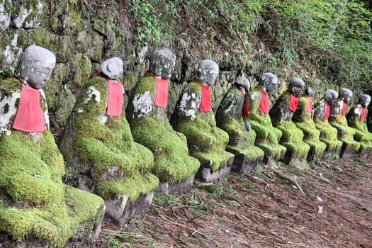 Nikko, Japan - jizo statues at famous Kanmangafuchi. Jizo, also known as Ksitigarbha are bodhisattvas in East Asian Buddhism.