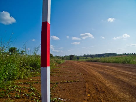 this is pole inside road  is way to farm
