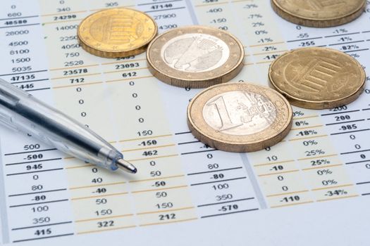 Business background, market analysis concept with financial data, pen and euro coins