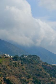 mijas hills covered whit clouds, mountains andalusia