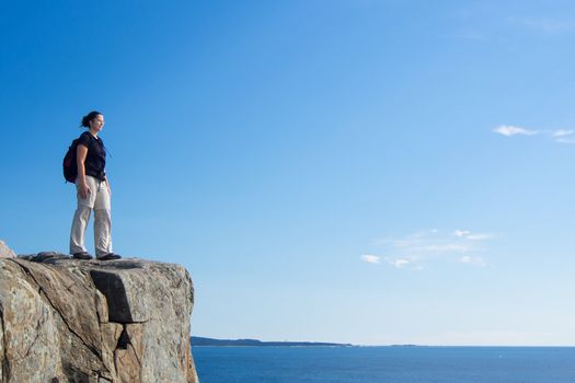 Woman hiking in Acadia National Park