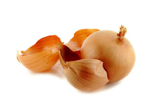 Ripe golden onions on white background.