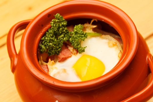 meat with egg in the pot