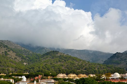 mijas hills covered whit clouds, mountains andalusia