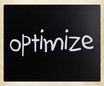 "Optimize" handwritten with white chalk on a blackboard