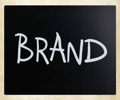 "BRAND" handwritten with white chalk on a blackboard