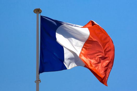 French flag on blue sky