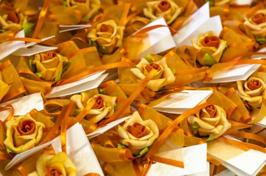 Group of orange roses used as wedding decoration.