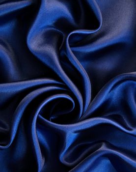 Smooth elegant dark blue silk can use as background 

