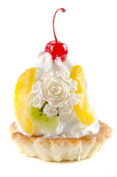 cupcake and bijouterie flower on a white background