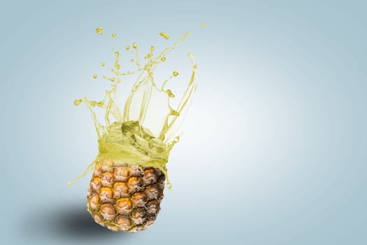 fresh pineapple juice spills, the concept of fresh fruit drinks, place for text