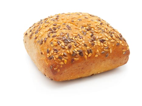 One tasty baked rolls with sesame isolated on a white background 