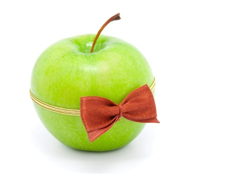 green apple with bow-tie isolated on white background