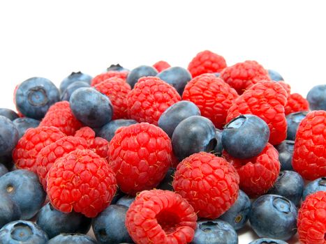 Blueberry and raspberries on white background 