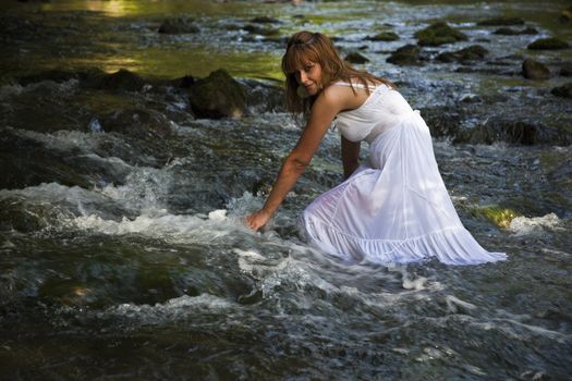 Girls With White Wet Dress Walking Cross The Stream, Cold Water, Eco tourism