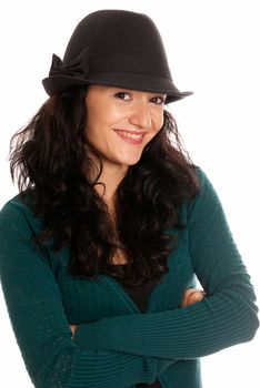 Young beautiful woman with hat arms crossed isolated on white background
