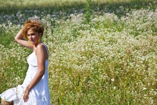 Red Hair Woman In White Dress Dancing In Green Savage Garden