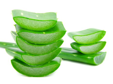 Sliced aloe leaves isolated on white background