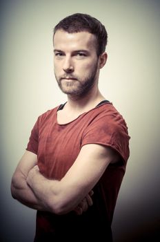 vintage portrait of fashion guy on gray background