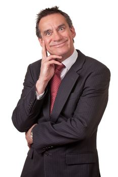Attractive Middle Age Business Man in Suit with Silly Grin and Hand to Face Isolated