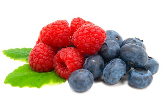 Blueberry and raspberries on white background 