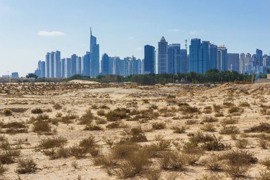  Midday heat in the desert in the background buildingsl on Nov 17, 2012 in Dubai UAE