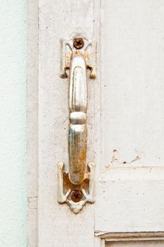 This is a old window handle on white window