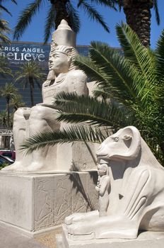 LAS VEGAS - MAY 29: Egyptian statue in front of Luxor Hotel and Casino on May 29, 2012 in Las Vegas. built in 1993, has the form of an Egyptian pyramid at the entrance stands a large statue of the Sphinx