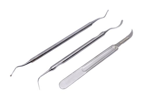 set of dental appliances: a scalpel, plugger and excavators