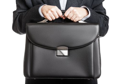 Business man in black suit hand holding briefcase white isolated