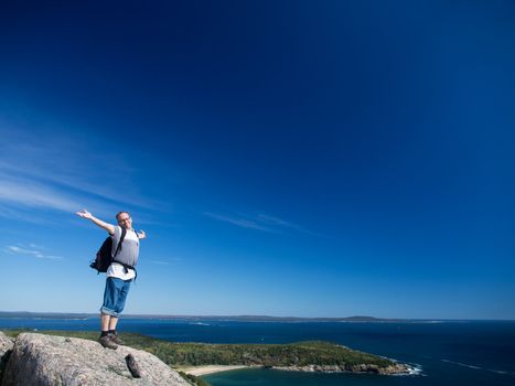 Man hiking in Acadia National Park