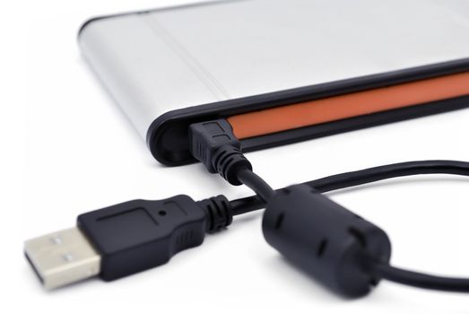 usb cable connected to a portable drive