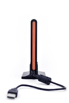 Portable hard drive on a stand in profile