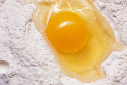 Backing ingredients: broken egg in a flour