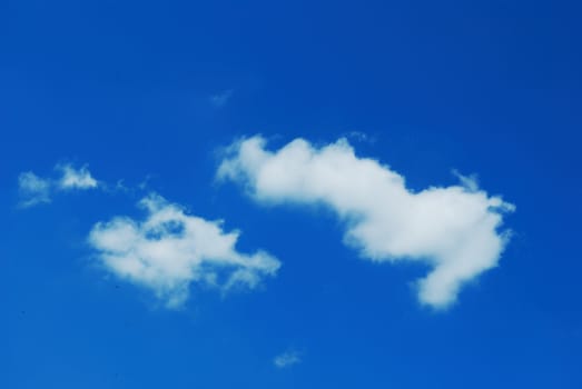 A white cloud in the blue sky