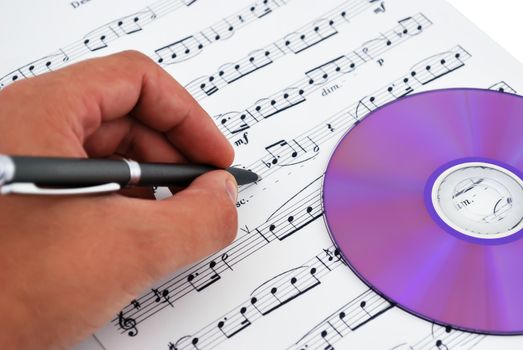 cd or dvd drive, musical notes and hand make notes